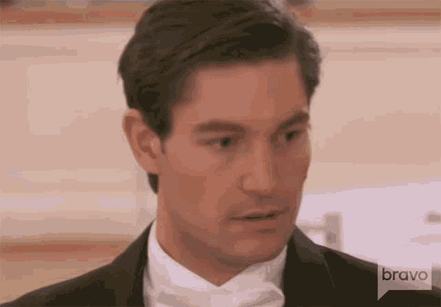 a man in a tuxedo and bow tie is on bravo tv