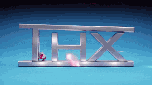 a thx logo on a blue background with a mouse