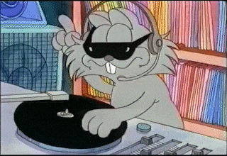 a cartoon beaver is wearing sunglasses and headphones while playing a record on a turntable .