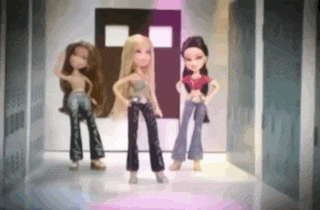 three dolls are standing next to each other in a locker room