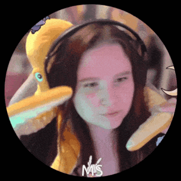 a girl wearing headphones is surrounded by stuffed animals and the word mis is on the bottom right corner