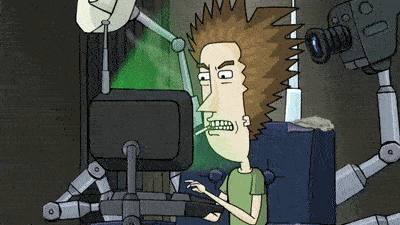 a cartoon character is sitting in front of a computer monitor