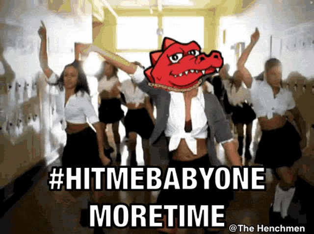 a group of girls are dancing in a hallway with the caption hitmebabyone moretime