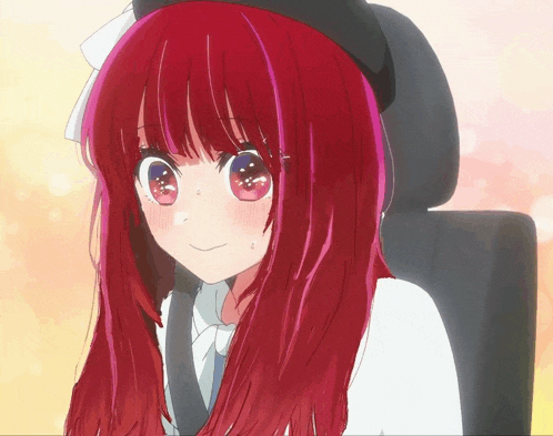 a girl with red hair and blue eyes is smiling