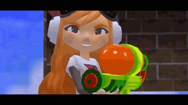 a cartoon girl is holding a green and orange toy