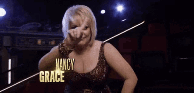 a woman in a sequined dress with nancy grace written on the bottom
