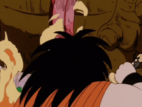 a close up of a cartoon character 's face with a sword in his mouth