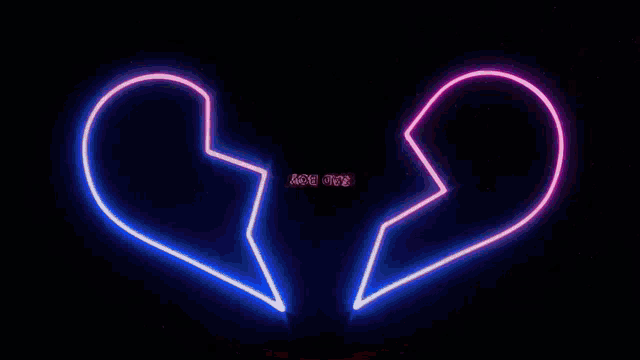 a neon sign of a broken heart with the word daddy written on it