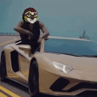 a man wearing a mask is sitting on the hood of a car .