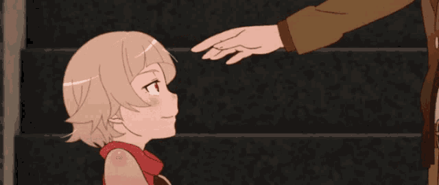 a man is putting his hand on a girl 's forehead