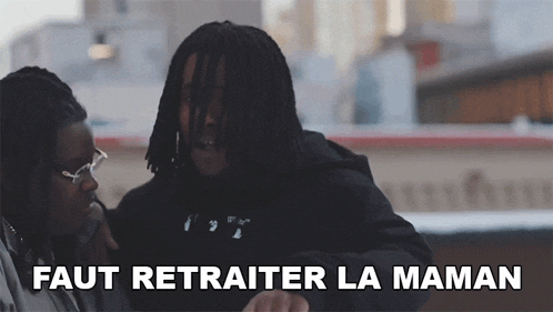 a man with dreadlocks talks to another man with the words faut retraiter la maman below him
