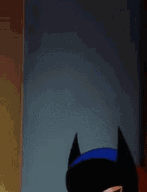 a cartoon of a woman in a batman costume peeking out from behind a door .