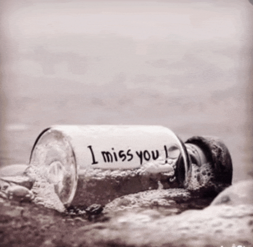a bottle that says i miss you on it