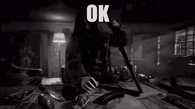a black and white photo of a man holding a rifle with the word ok above him