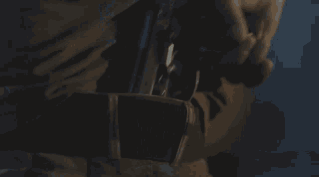 a close up of a man 's face with a glowing light coming out of it