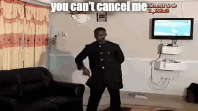 a man is dancing in a living room with the words " you can 't cancel me " on the bottom