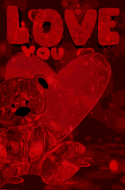 a red teddy bear with a heart on its back and the word love