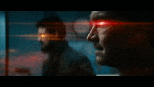 a man with a red light coming out of his eyes