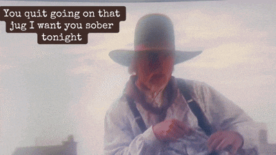 a man in a hat is smoking a cigarette with the words you quit going on that jug i want you sober tonight above him