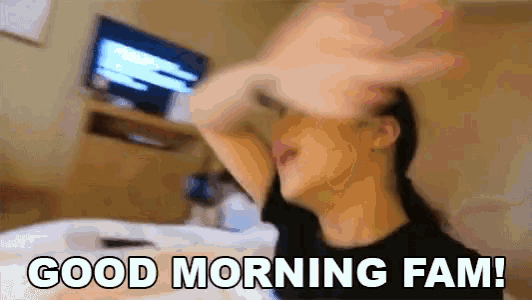 a man laying on a bed with his hands on his head and the words good morning fam
