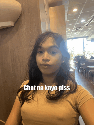 a woman taking a selfie with chat na kayo plss written in the corner