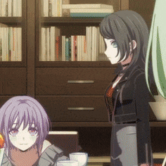a couple of anime girls standing next to each other