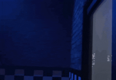 a cartoon cat with a top hat and bow tie is standing in a doorway .