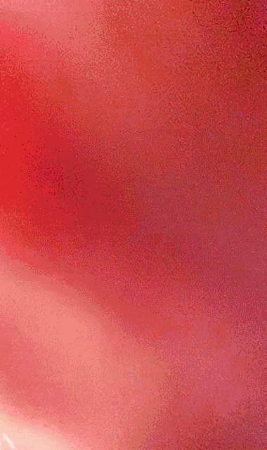 a blurry picture of a pink and white striped shirt