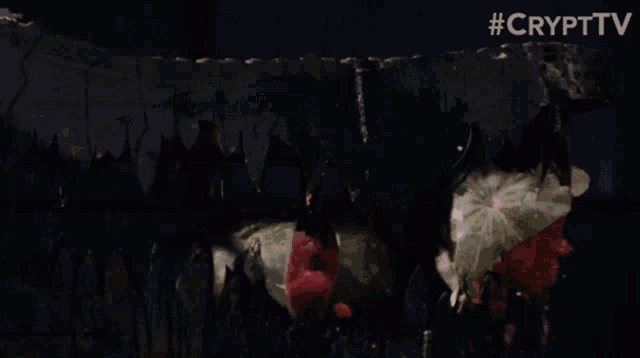 a watermelon is being sliced by a knife and the words #crypttv are visible
