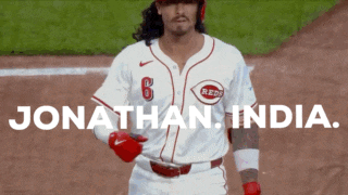 a baseball player with the number 8 on his jersey is running on the field
