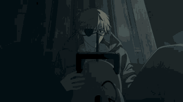 a man with a bandage on his eye is holding a chainsaw in his hand