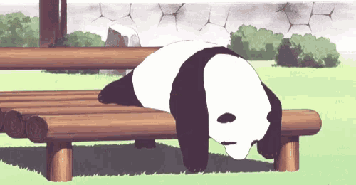 a panda bear is laying on a wooden bench in a park .