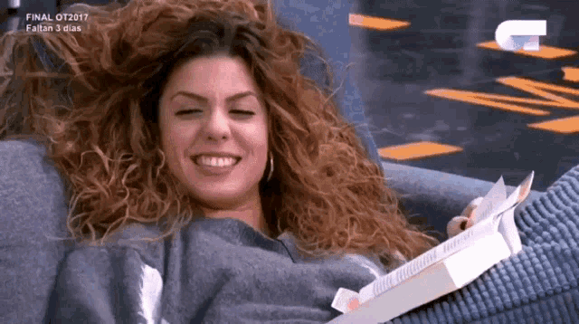 a woman is laying on a couch with her eyes closed and the words final ot2017 on the bottom right