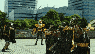 a man in a costume with a sword and shield stands in front of a building