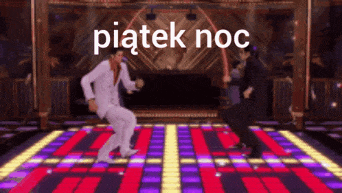 two men are dancing on a dance floor with the words piatek noc on the bottom right