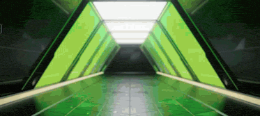 an empty hallway with green walls and a ceiling