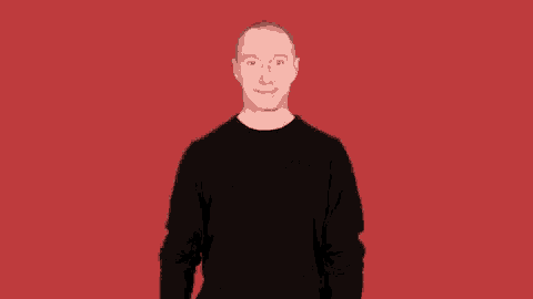 a man in a black sweater is giving a thumbs up