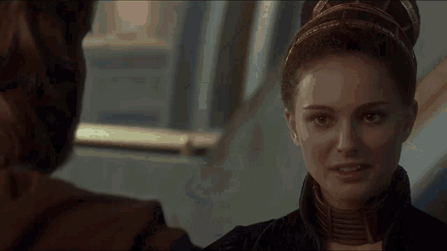 a woman talking to a man with the words ani my goodness you 've grown visible