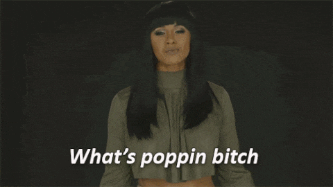 a woman says " what 's poppin bitch " in front of a dark background