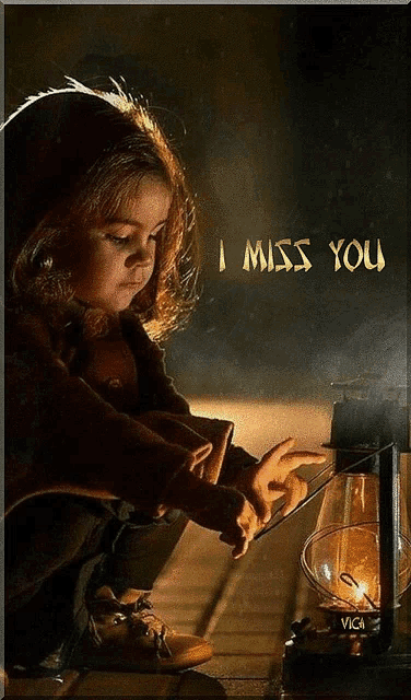 a picture of a little girl with the words i miss you