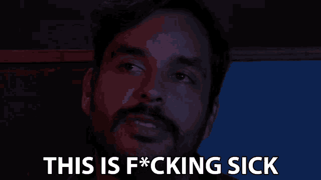 a man says this is f * cking sick in a dark room