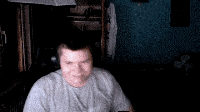 a man wearing headphones and a shirt that says ' abercrombie & fitch ' on it