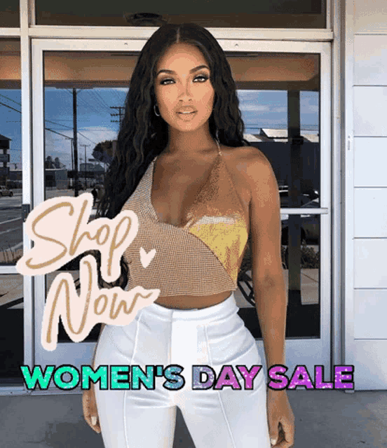 a woman wearing a gold top and white pants is standing in front of a door that says shop now