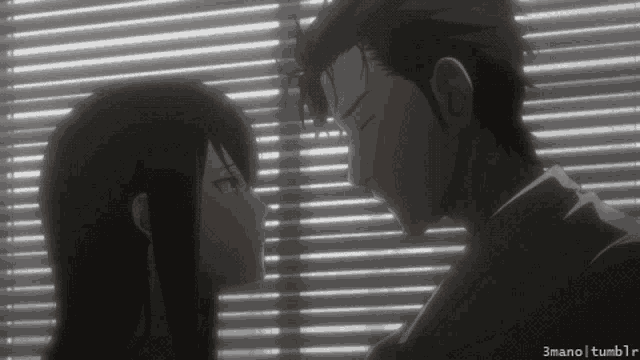 a man and a woman are looking at each other in front of blinds and the words 3mano tumblr are on the bottom right