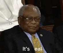an older man in a suit and tie says it 's real