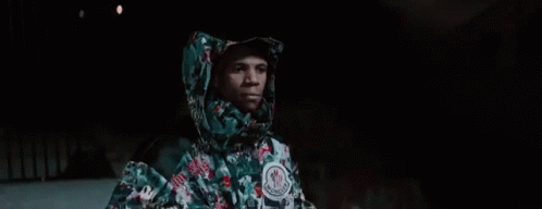 Pull Hood Down Serious GIF - Pull Hood Down Serious No Emotion GIFs