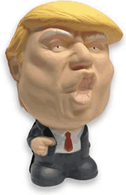 a donald trump figurine with his mouth open and a red tie