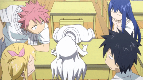 a group of anime characters are sitting around a table with one girl laying on the floor