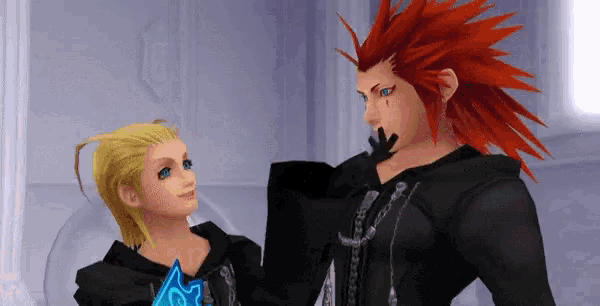a man with red hair is standing next to a woman with blonde hair in a video game .