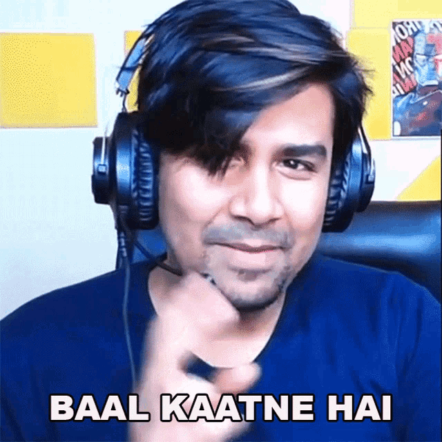 a man wearing headphones says " baal kaatne hai " in a foreign language
